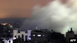 Smoke billows following an Israeli strike in Rafah in the southern Gaza Strip on Dec. 8, 2023