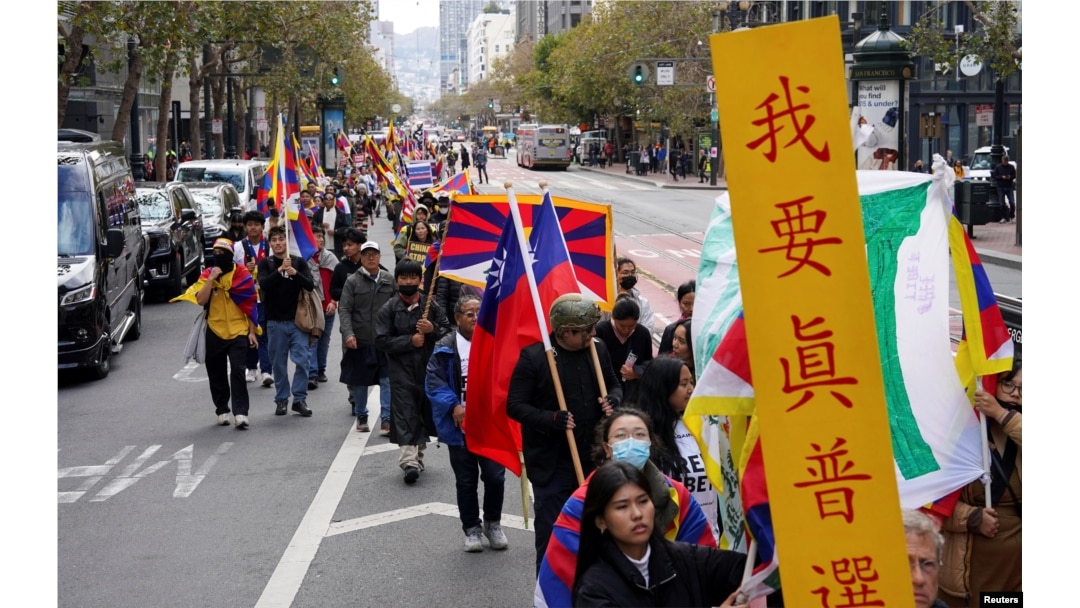 People protest against Chinese President Xi Jinping during the Asia-Pacific Economic Cooperation summit in San Francisco, Nov. 15, 2023.