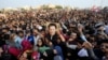 Supporters of Pakistan Tehreek-e-Insaf (PTI) a political party of former Pakistani Prime Minister Imran Khan, hold a rally against the decision of election commission for the electoral symbol of a cricket bat, Jan. 14, 2024. 