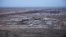 FILE — This Dec. 29, 2019, aerial photo shows Iraq's Ain al-Asad air base in the western Anbar desert. U.S. personnel suffered minor injuries and a member of Iraq's security forces was seriously wounded in an attack on the base Saturday, a U.S. official said. 