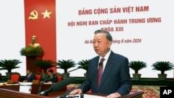 Vietnamese President To Lam delivers a speech during a news conference held by the Central Committee of the Communist Party, which elected Lam as the new Communist Party Chief, the country’s most power role, Aug. 3, 2024, Hanoi. 