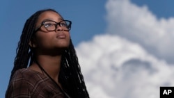 Harmony Kennedy, 16, a high school student, poses for a portrait in Nolensville, Tenn., on Tuesday, May 16, 2023. (AP Photo/George Walker IV)