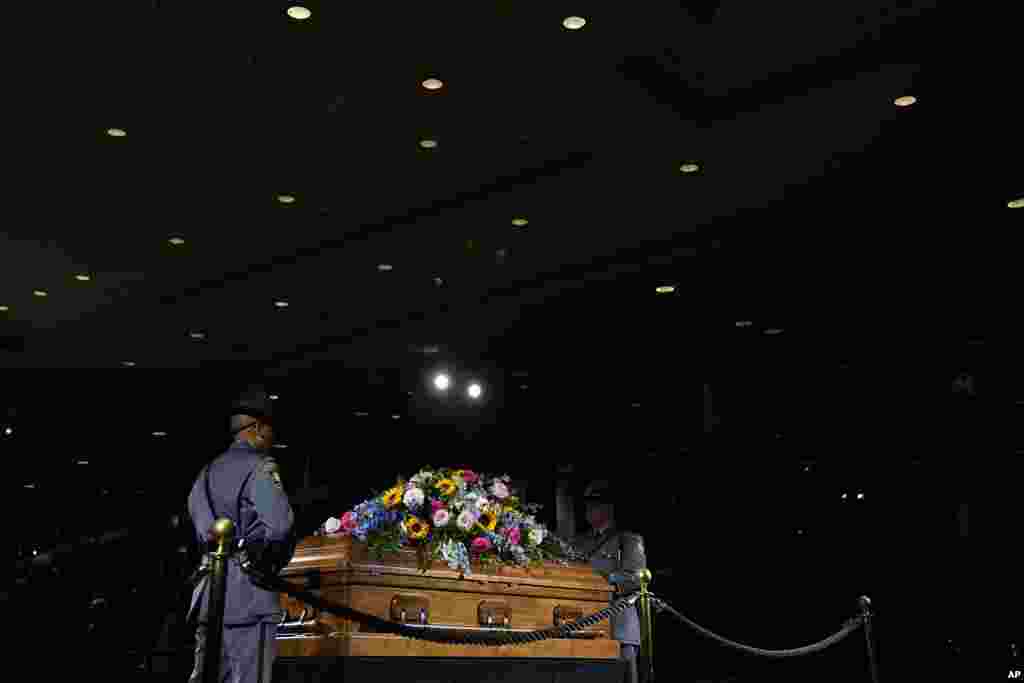 A Georgia State Patrol honor guard stands as members of the public pay respects to former first lady Rosalynn Carter at the Jimmy Carter Presidential Library and Museum in Atlanta, Nov. 27, 2023, during the public repose. 