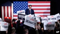 Republican presidential candidate and Florida Gov. Ron DeSantis speaks to supporters during a caucus night party, Jan. 15, 2024, in West Des Moines, Iowa.