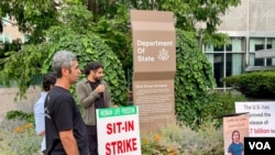 The National Solidarity Group for Iran activist group ends its two-week sit-in on a sidewalk near an entrance of the US State Department's Harry S Truman building in Washington on June 16, 2023. (Michael Lipin/VOA)