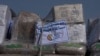 FILE - Aid bound for the Gaza Strip is seen on a truck at Kerem Shalom Crossing on the intersection of two borders: between Egypt and Israel and the Gaza Strip and Israel, Jan. 10, 2024. The U.S. military has been ordered to build a port in Gaza to assist in delivering aid.