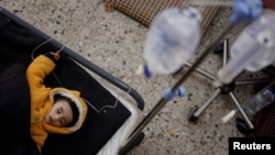A Palestinian boy, who is suffering from malnutrition, receives treatment at a health care center, amid widespread hunger, as the conflict between Israel and Hamas continues, in Rafah, in the southern Gaza Strip, March 4, 2024. 