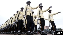 FILE - Members of Nigeria's military march at the inauguration of Nigerian President Bola Tinubu, at Eagle Square in Abuja, Nigeria, May 29, 2023. 