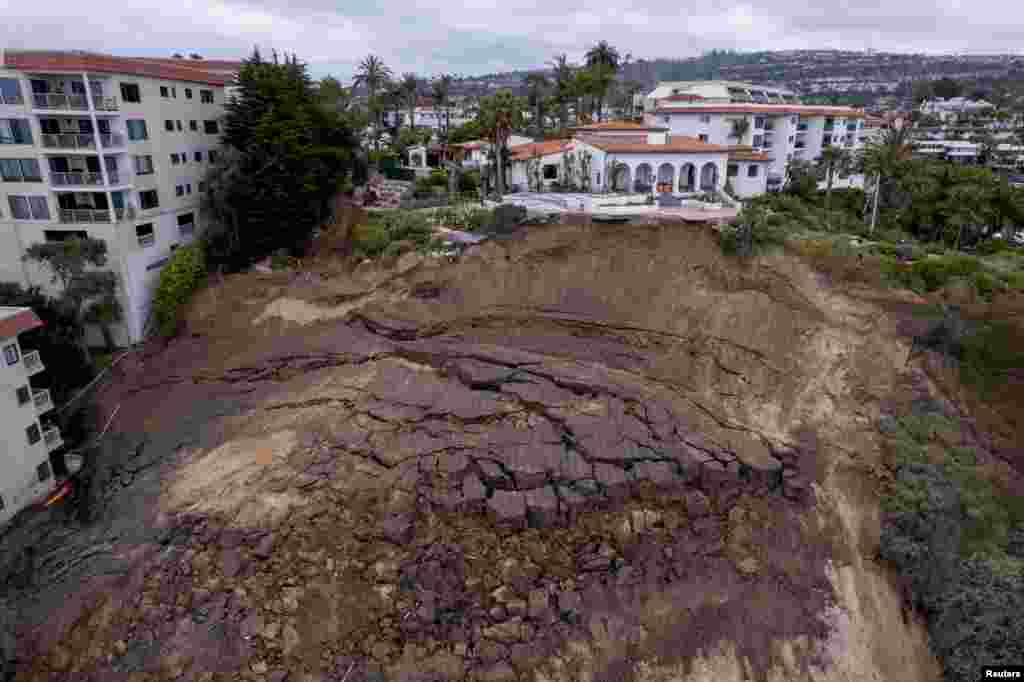 A landslide under the historic Casa Romantica in San Clemente suspends rail service in the area as officials asses the situation in San Clemente, California, June 5, 2023