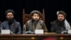 FILE - Taliban acting Defense Minister Mohammad Yaqoob Mujahid, center, speaks at a press conference in Kabul, Afghanistan, Dec. 31, 2023. 