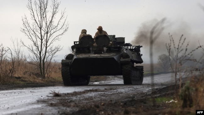 A Ukrainian armored vehicle rides on a road not far from the front line in Donetsk region on Nov. 16, 2023, amid the Russian invasion of Ukraine.