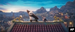 This image released by Universal Pictures shows the characters Po, voiced by Jack Black, left, and Zhen, voiced by Awkwafina, in a scene from 