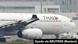 A Thai Airways aeroplane is seen after making contact with Eva Air aeroplanes at Haneda Airport, in Tokyo, Japan, (Photo: Kyodo via REUTERS)