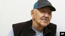 In this photo provided by Aleutian Pribilof Islands Association, Inc., Gregory Golodoff takes part in an interview, April 26, 2023, in Anchorage, Alaska. Golodoff was the last living resident of Attu, Alaska, whose residents were captured by the Japanese in World War II.