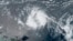 This GeoColor satellite image taken June 20, 2023, and provided by NOAA, shows Tropical Storm Bret as it chugged toward the eastern Caribbean.