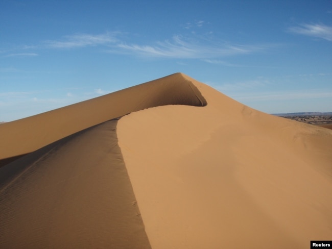 A view of the Lala Lallia star dune of the Sahara Desert, in Erg Chebbi, Morocco, as seen in an undated handout image from 2008 and obtained by Reuters on March 1, 2024. (Charlie Bristow/Handout via REUTERS)