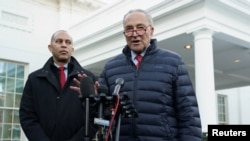 U.S. Senate Majority Leader Chuck Schumer and House of U.S. Representatives Democratic leader Hakeem Jeffries speak to reporters outside the White House after Democratic and Republican leaders met with U.S. President Joe Biden in Washington, Jan. 17, 2024. 