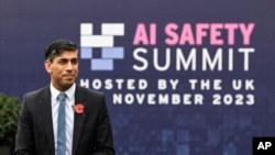 Britain's Prime Minister Rishi Sunak arrives for the second day of the Artificial Intelligence Safety Summit, at Bletchley Park, in Bletchley, England, Nov. 2, 2023.