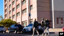 Las Vegas Metro Police respond to a shooting reported on the campus of the University of Nevada, Las Vegas, Dec. 6, 2023.