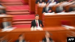中国领导人习近平在北京人大会堂出席全国人大会议开幕式。（2024年3月4日）