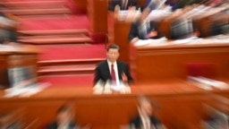 中国领导人习近平在北京人大会堂出席全国人大会议开幕式。（2024年3月4日）