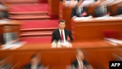 中国领导人习近平在北京人大会堂出席全国人大会议开幕式。（2024年3月4日）