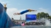 Italy's Alessio Crociani dives into the Seine river to start the swimming stage of the men's individual triathlon at the Paris 2024 Olympic Games in central Paris on July 31, 2024.