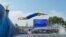 Italy's Alessio Crociani dives into the Seine river to start the swimming stage of the men's individual triathlon at the Paris 2024 Olympic Games in central Paris on July 31, 2024.