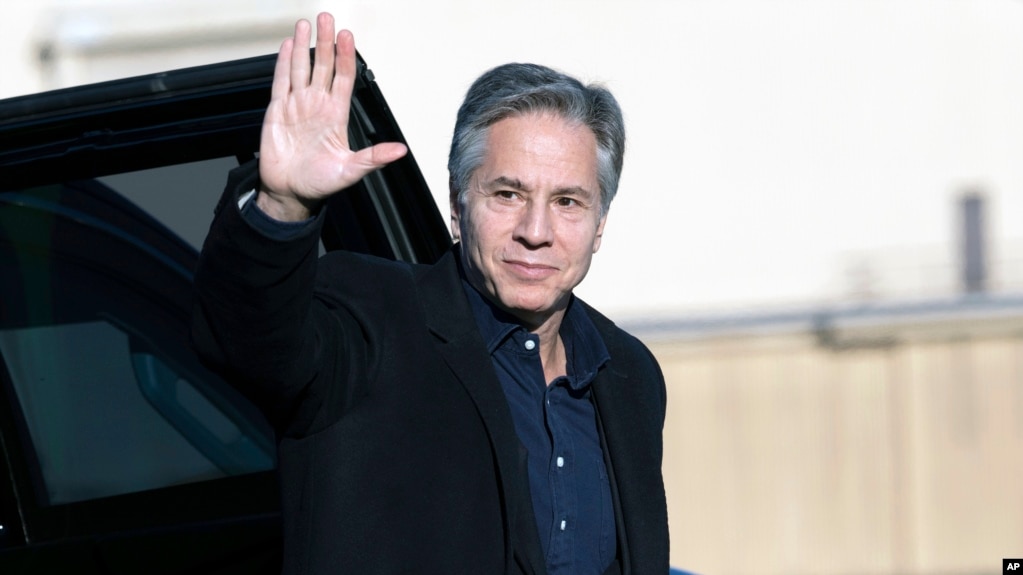 FILE — U.S. Secretary of State Antony Blinken waves before boarding a plane at Andrews Air Force Base in Maryland, Nov. 27, 2023. An official says the secretary will get on a plane again on Thursday night, traveling to the Middle East.