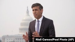 FILE - British Prime Minister Rishi Sunak talks to media during his visit to Washington, D.C., June 7, 2023.