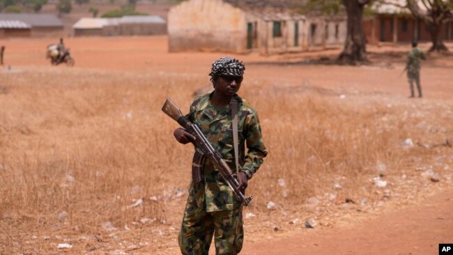 A Nigerian soldier patrol sat the LEA Primary and Secondary School Kuriga where students were kidnapped in Kuriga, Kaduna Nigeria, March 9, 2024.