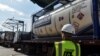 FILE - Trucks containing crude oil are seen at Kenya Petroleum Refineries plant in Mombasa, on June 7, 2018. 