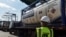 FILE - Trucks containing crude oil are seen at Kenya Petroleum Refineries plant in Mombasa, on June 7, 2018. 