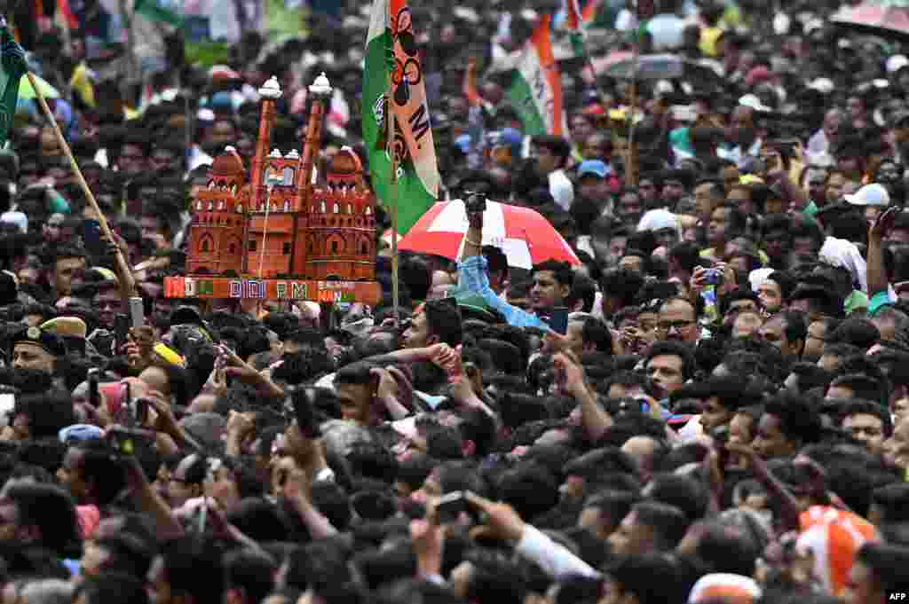 Supporters of the Trinamool Congress (TMC) party attend a rally to mark the annual Martyrs Day in Kolkata.