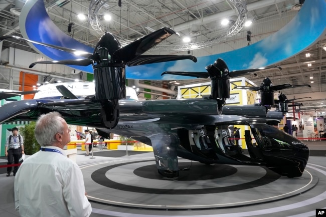 The Archer midnight flying taxi is exhibited at the Paris Air Show, Wednesday, June 21, 2023 in Le Bourget, north of Paris. (AP Photo/Michel Euler)