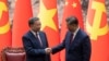 Chinese President Xi Jinping, right, and Vietnam's President To Lam shake hands after a signing ceremony at the Great Hall of the People in Beijing, Aug. 19, 2024. 