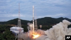 FILE - A photo by North Korean government purports to show the launch of the Chollima-1 rocket carrying the Malligyong-1 satellite, May 31, 2023. The image's content cannot be independently verified. 