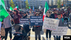 En Fotos | Cientos de personas marchan a la Casa Blanca para exigir protecciones laborales para los inmigrantes indocumentados 