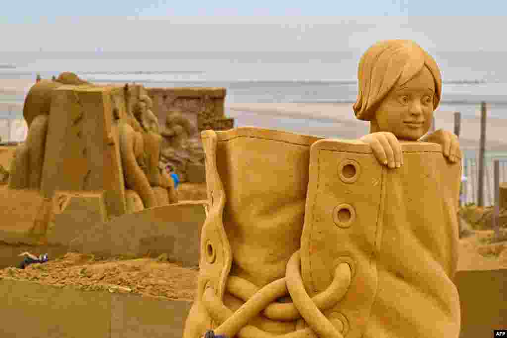 A sand sculpture representing figures in stories called fairy tales is seen ahead of the start of the Sand Sculpture Festival, in Middelkerke, Belgium.