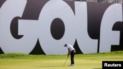 FILE - England's Sam Horsfield putts during the second round of the inaugural LIV Golf Invitational at Centurion Club, Hemel Hempstead, Britain, June 10, 2022. 