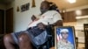 A portrait of American soldier Travis King is displayed as his grandfather, Carl Gates, talks about his grandson July 19, 2023, in Kenosha, Wis.