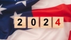 United States election. Wooden cubes with letters 2024 over the American flag background