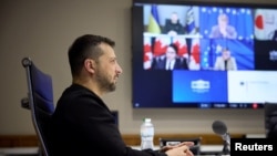 Ukraine's President Volodymyr Zelenskyy attends a videoconference with G7 Leaders, in Kyiv, Ukraine, Dec. 6, 2023. (Ukrainian Presidential Press Service via Reuters)