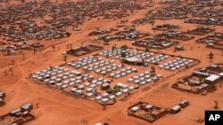 FILE- An aerial view shows a camp of internally displaced people in Djibo, Burkina Faso, May 26, 2022.