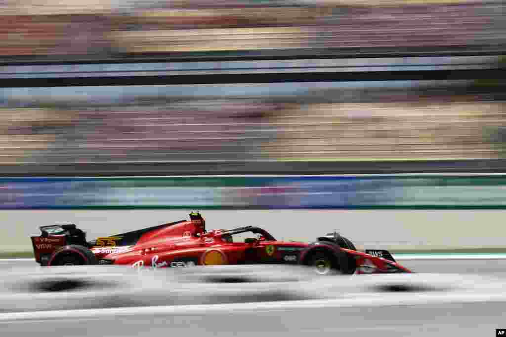 Ferrari driver Carlos Sainz of Spain steers his car during the first practice session for Sunday's Spanish Formula One Grand Prix, at the Barcelona Catalunya racetrack in Montmelo, Spain.