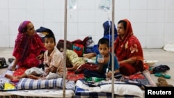 FILE - Dengue infected people are hospitalized for treatment at Mugda Medical College and Hospital, as the yearly death toll from the disease has surpassed the previous record in the country, in Dhaka, Bangladesh, Sept. 5, 2023. 