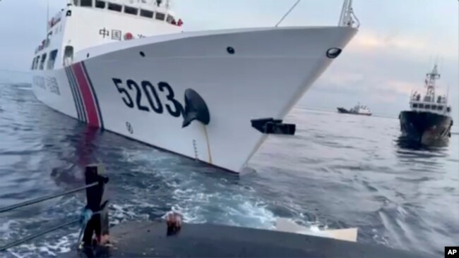 This image shows a Chinese coast guard ship with bow number 5203 after bumping a Filipino supply boat as they approach Second Thomas Shoal in South China Sea on Sunday Oct. 22, 2023. (Armed Forces of the Philippines via AP)