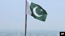 FILE - A Pakistani flag flies at a lookout in Islamabad, Pakistan, on July 27, 2022. Pakistan said Jan. 25, 2024, that it has "credible evidence" linking India to recent assassinations of Pakistani citizens.