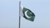 FILE - A Pakistani flag flies at a lookout in Islamabad, Pakistan, on July 27, 2022. 