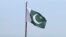FILE - A Pakistani flag flies at a lookout in Islamabad, Pakistan, on July 27, 2022. 